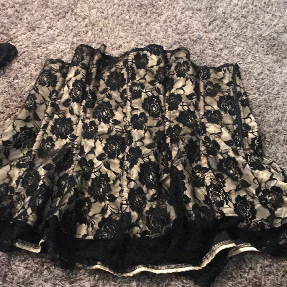 Gold and black lace corset